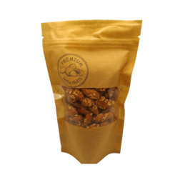 Karamelizuoti Kalifornijos migdolai su sezamo sėklomis, 100 g